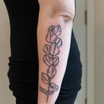 Eucalyptus tattoo on the forearm