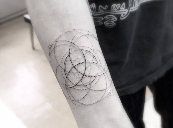 Fine line geometry tattoo