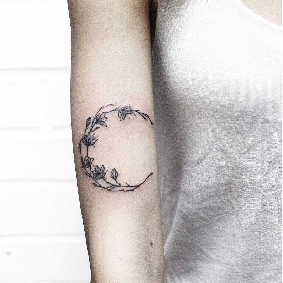 Floral moon tattoo