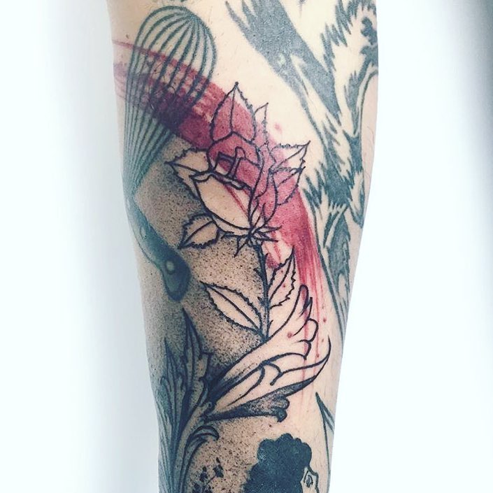 Flower and red brush stroke tattoo by Unkle Gregory 