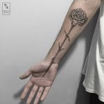 Flower tattoo on the forearm by Marla Moon