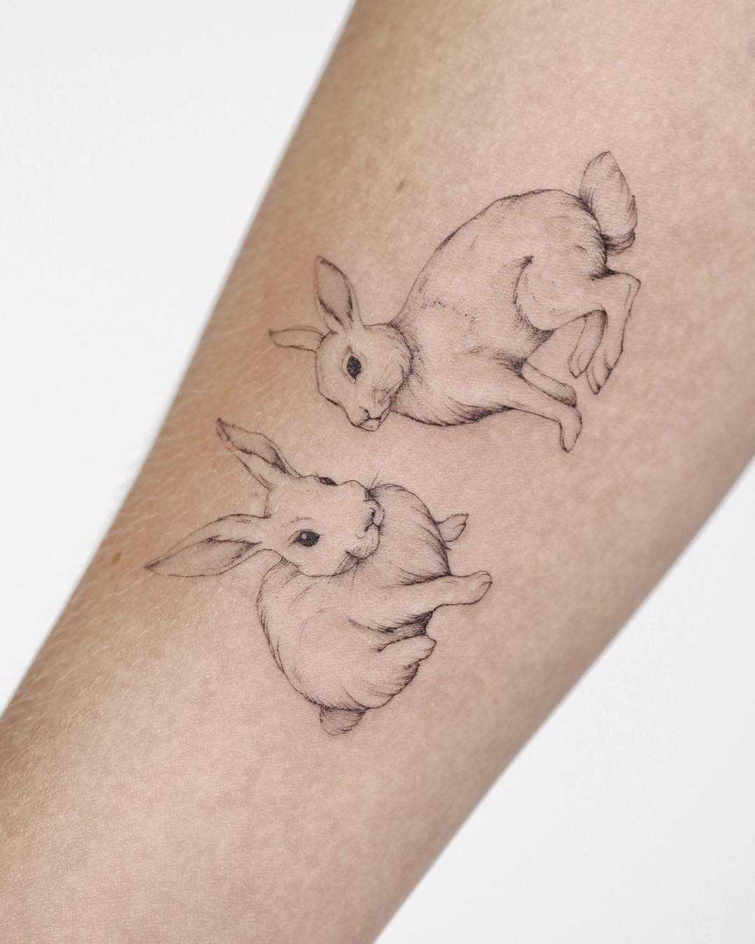 Fluffy bunnies tattoo