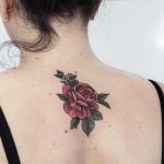 Gorgeous rose tattoo on the back