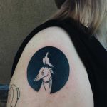 Greyhound and dove tattoo