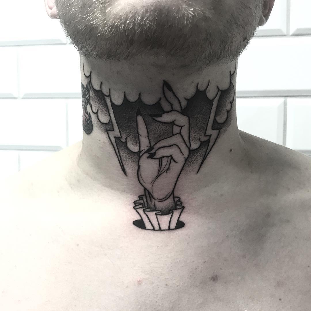 Hand and lightning bolt tattoo on the neck