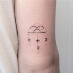 Hand-poked cloud tattoo