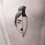 Hand-poked women and knife tattoo