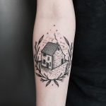 House and wreath tattoo