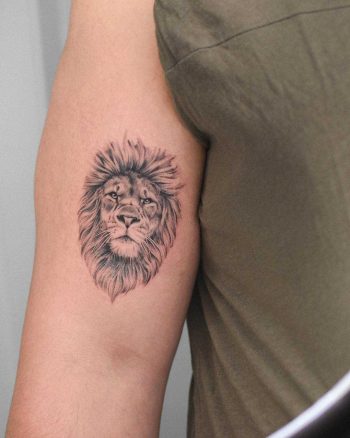 Hyper realistic lion tattoo