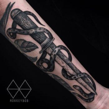 Knife and two headed snake tattoo