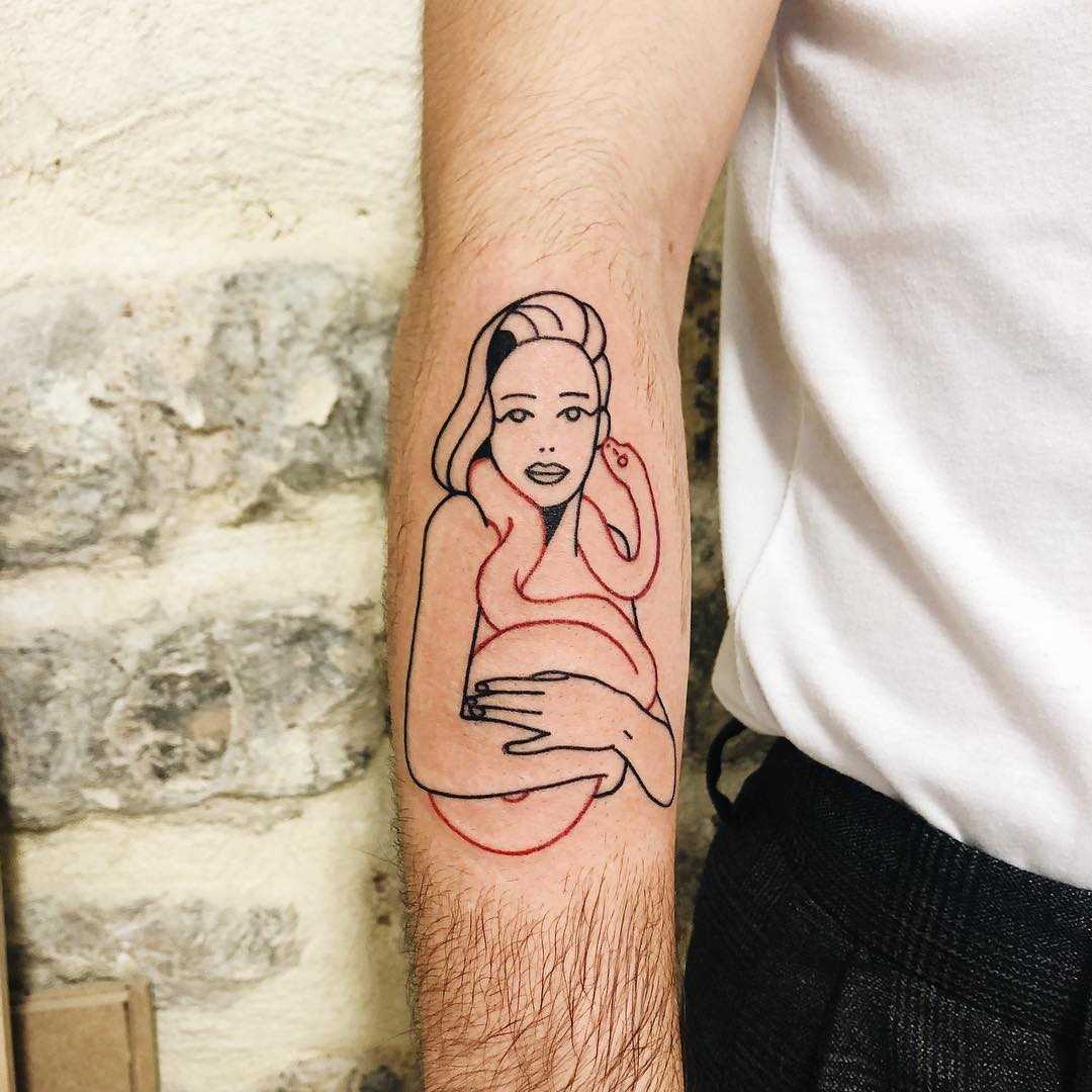 Lady with a snake tattoo