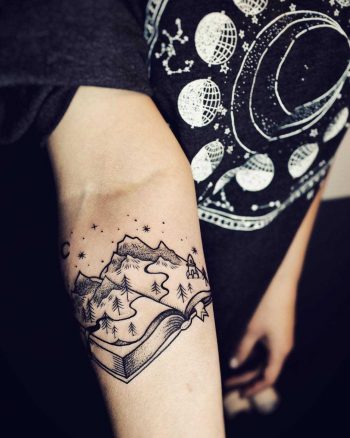 Landscape book tattoo by Sasha Tattooing