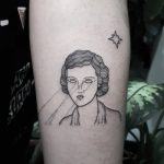 Laser beam lady tattoo