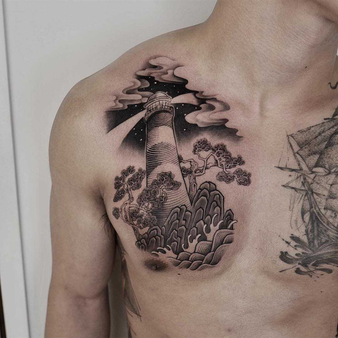 Lighthouse tattoo on the chest