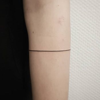 Line tattoo done at Mu Body Arts