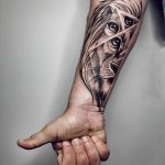 Lion tattoo on the forearm by Sasha Tattooing