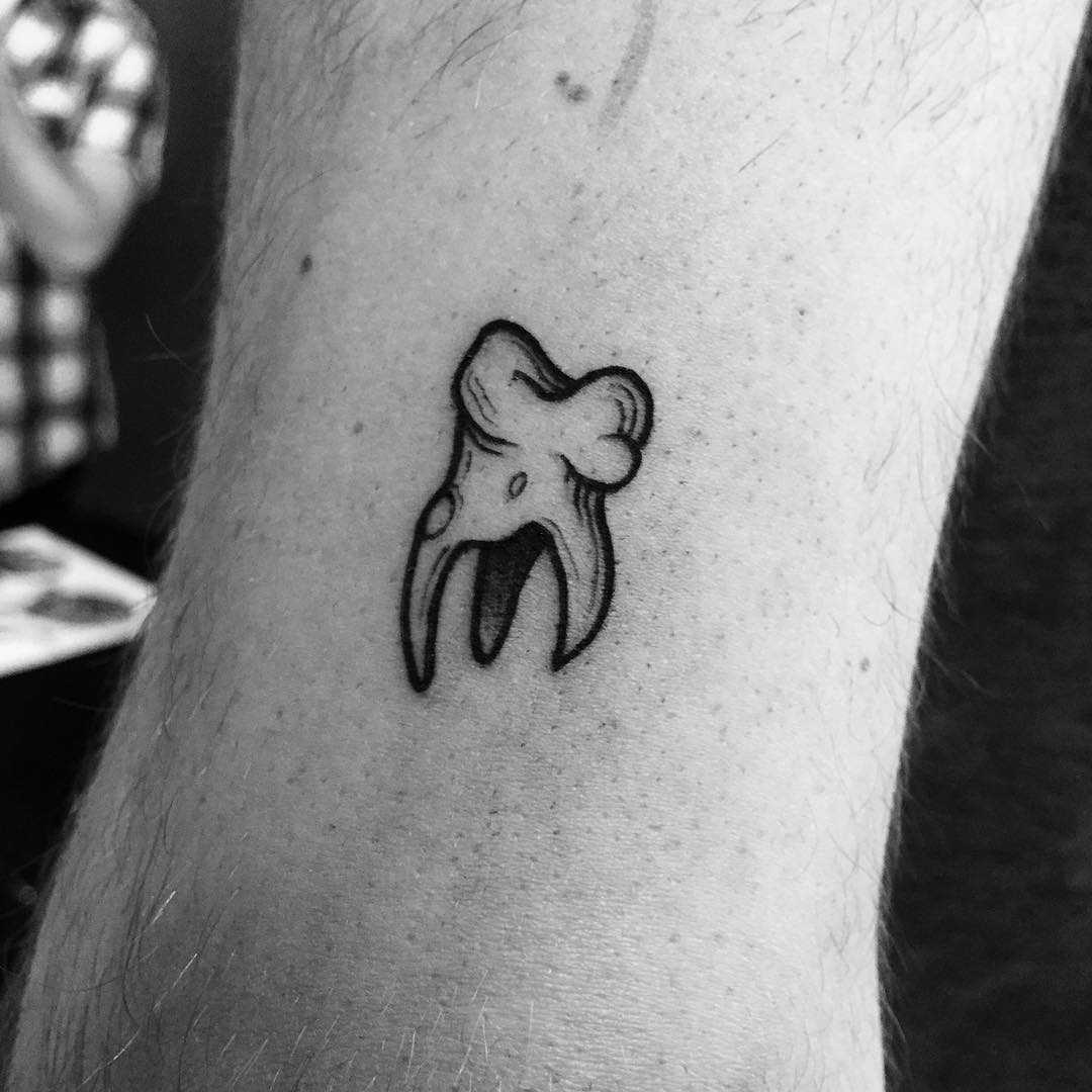 Little tooth done at Bern Tattoo Convention