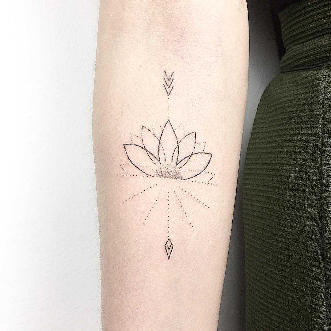 Lotus arrow by Femme Fatale Tattoo
