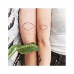 Matching cloud tattoos for a coupl