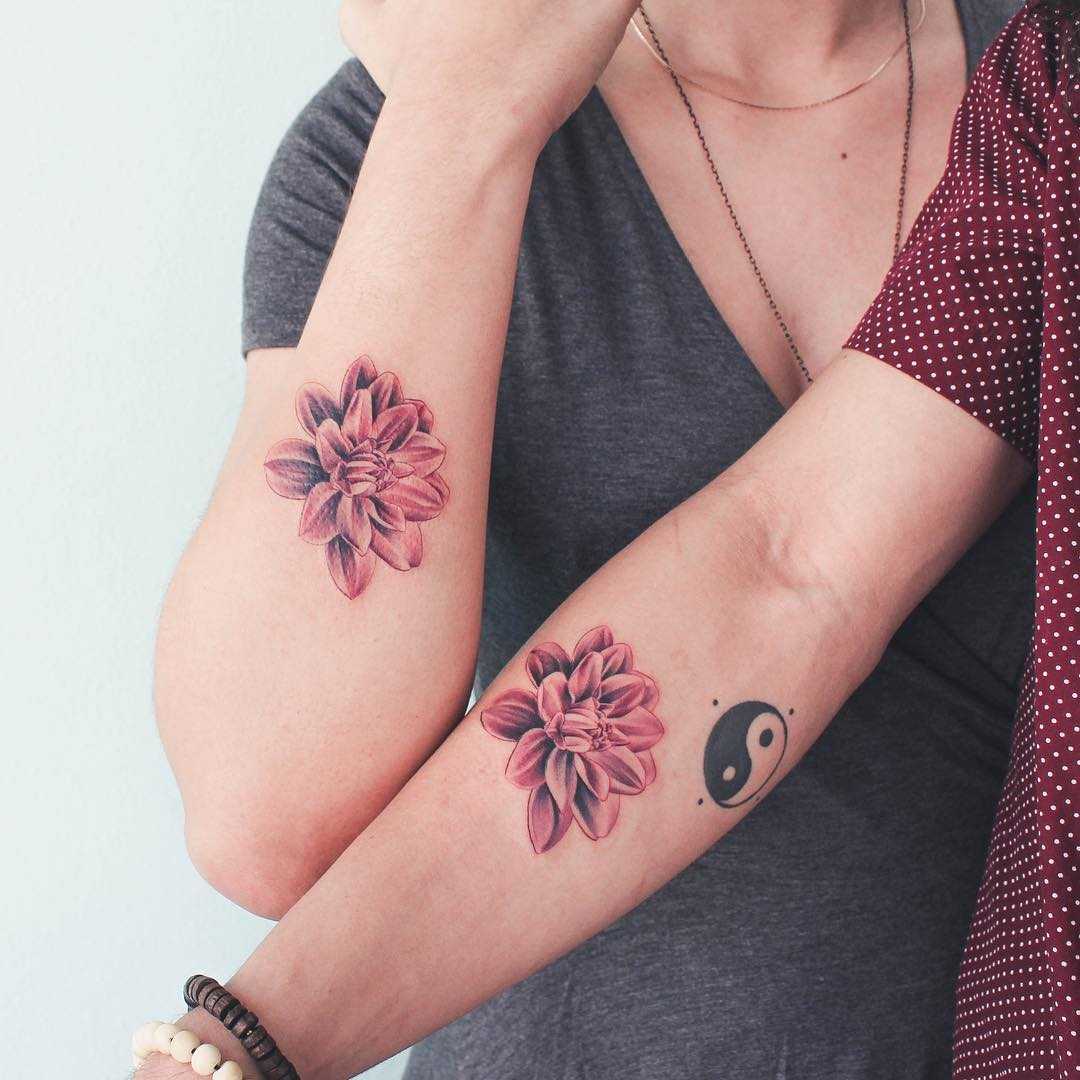 Matching flower tattoos for a couple 