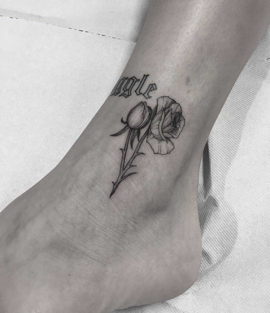 Minimalist rose tattoo on the ankle