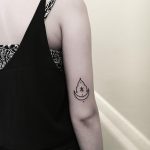 Moon and roof silhouette tattoo