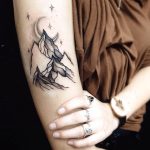 Mountain range tattoo by Sasha Tattooing