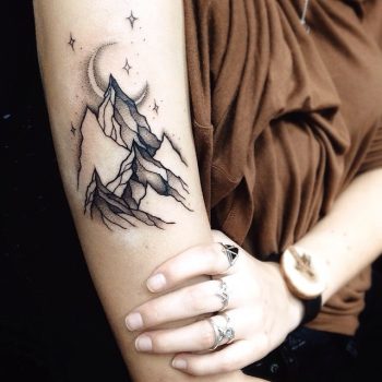 Mountain range tattoo by Sasha Tattooing