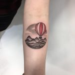 Mountainous landscape and hot air balloon done at Kult Tattoo Fest