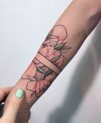Negative space armband and flowers tattoo