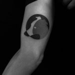 Negative space whippet tattoo