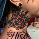 Old-school rose tattoo on the neck