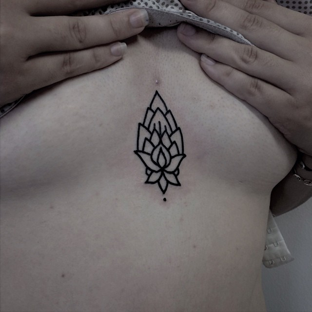 Outline ornamental flower on the sternum