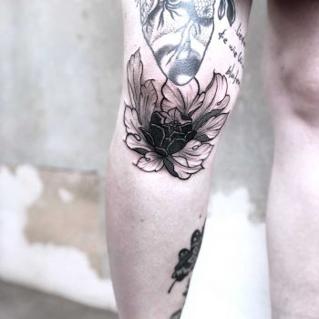 Peony tattoo on the knee