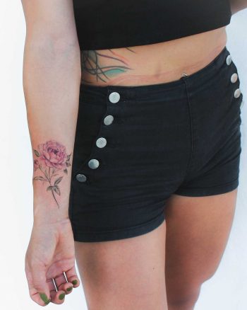 Peony tattoo on the right wrist