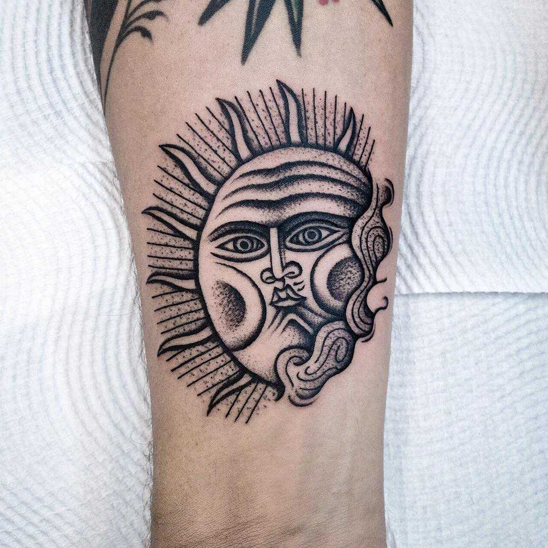 Personified sun tattoo