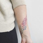 Pink lupine tattoo