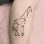 Polygonal giraffe tattoo by Jen Wong