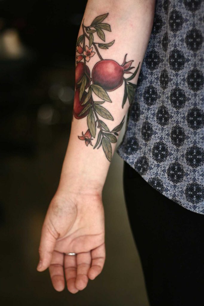 Pomegranate tattoo by Alice Carrier
