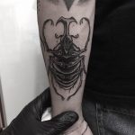 Rhino scarab tattoo