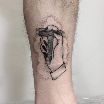 Skateboard tool tattoo