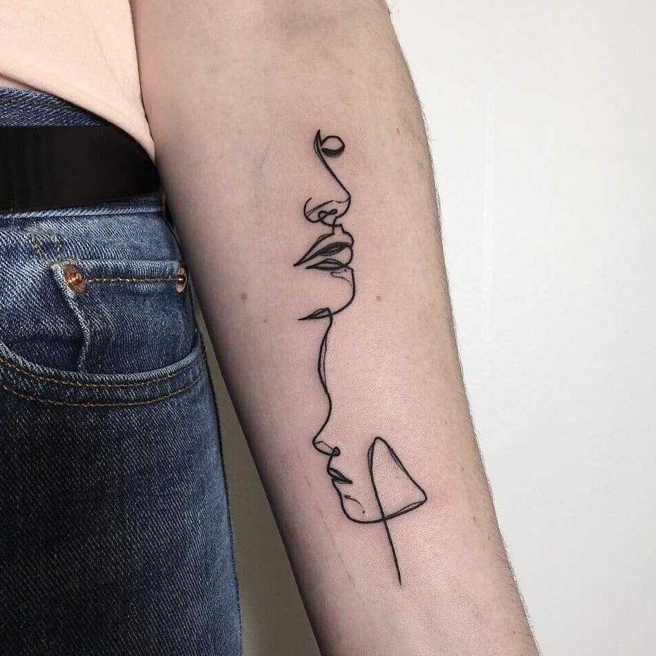 Sketchy face silhouettes tattoo