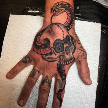 Skull and snake tattoo by Fiona Cest La Fi