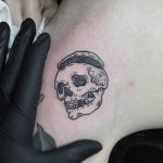 Skull tattoo on the shoulder