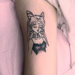 Small anime lady tattoo