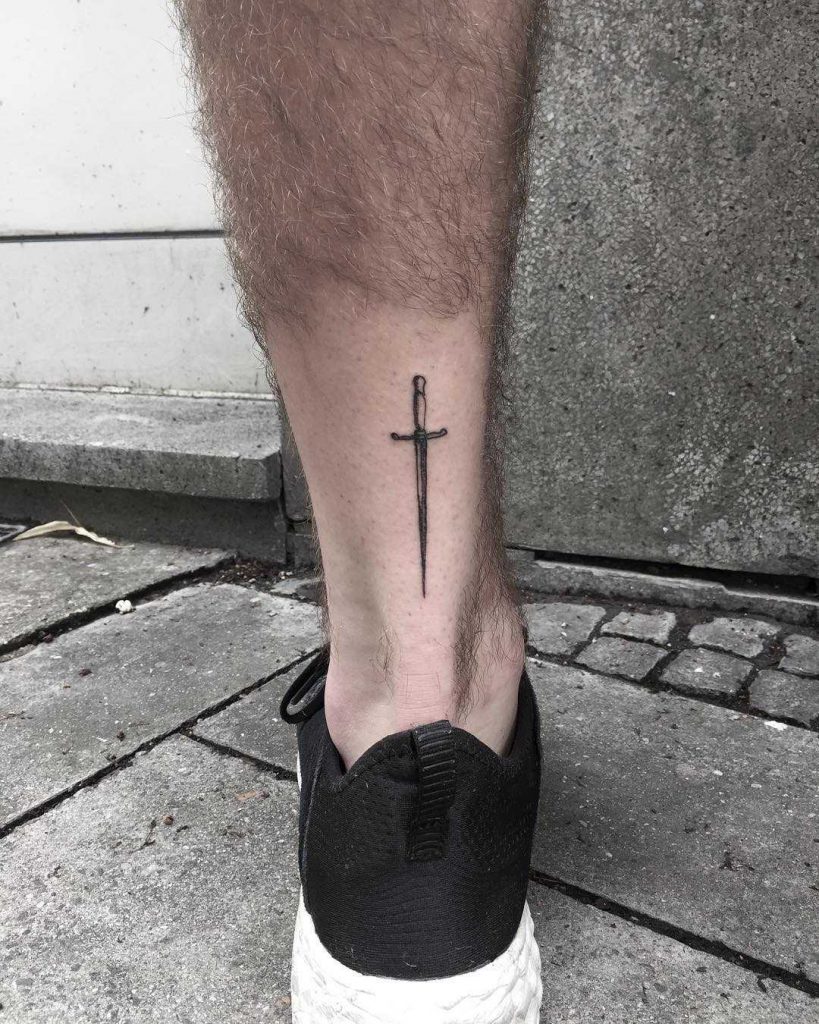 Small sword tattoo by Nerdy Match Marco