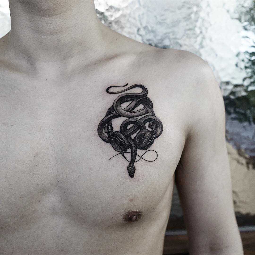 Snake and headphones tattoo
