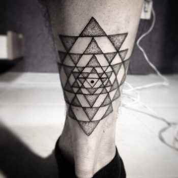 Sri Yantra tattoo on the calf