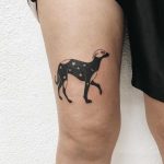 Starry dog tattoo