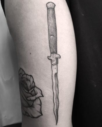 Stiletto and rose tattoo